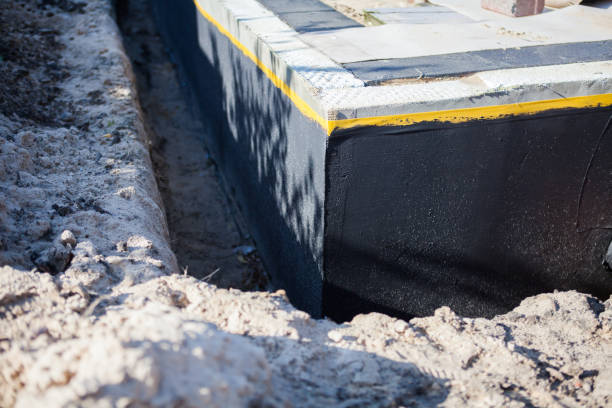 Professional Waterproofing technician working in Burton, SC